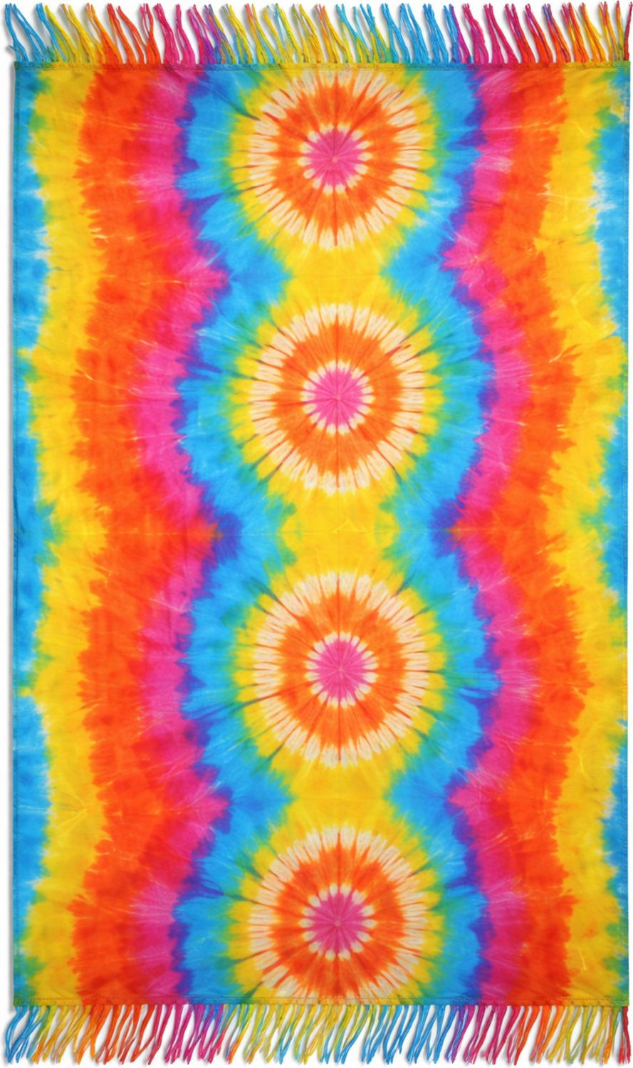 Colorful tie-dye sarong with circular patterns and fringes on a plain background