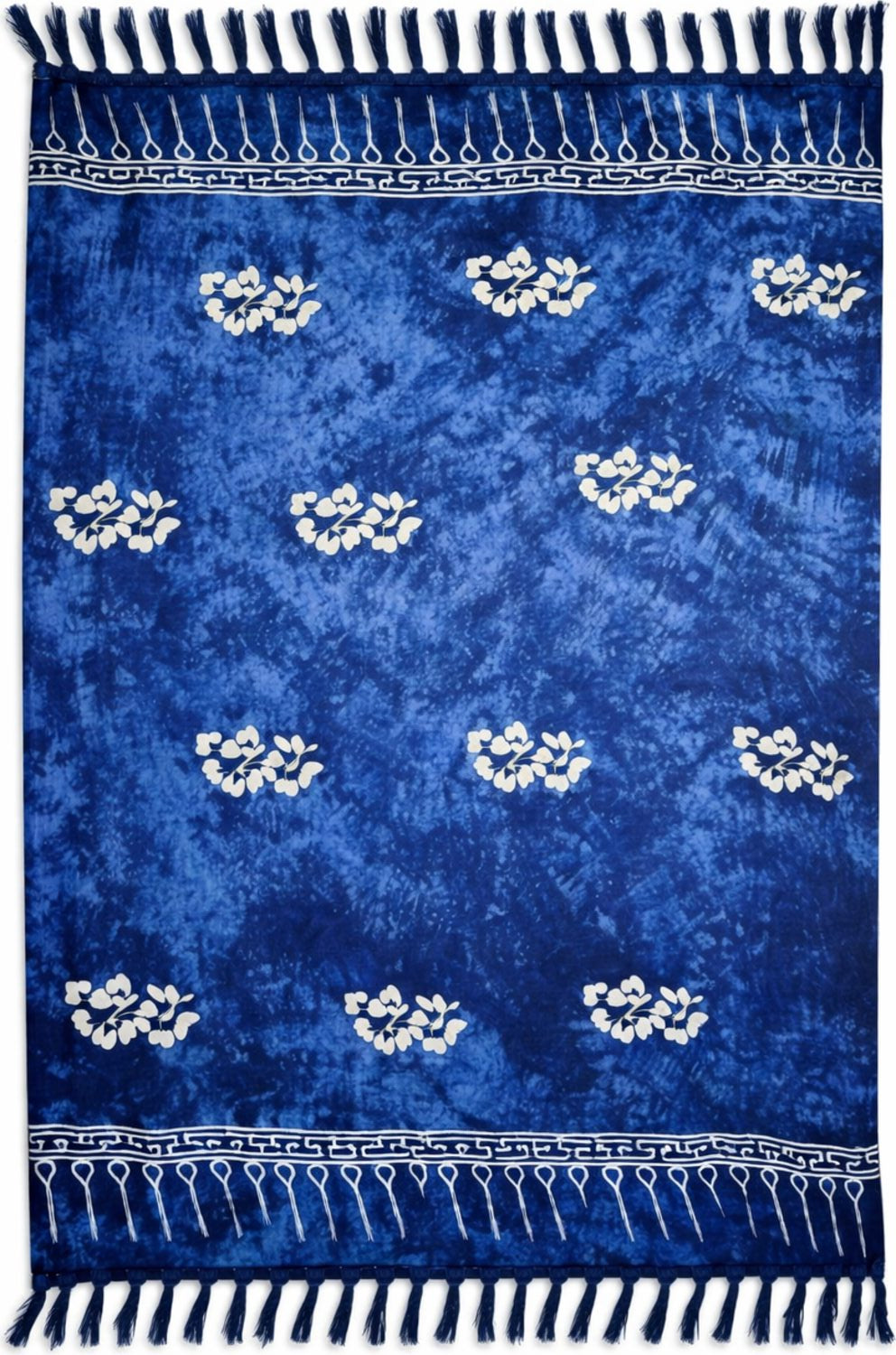 Blue patterned sarong with white floral designs and fringes.