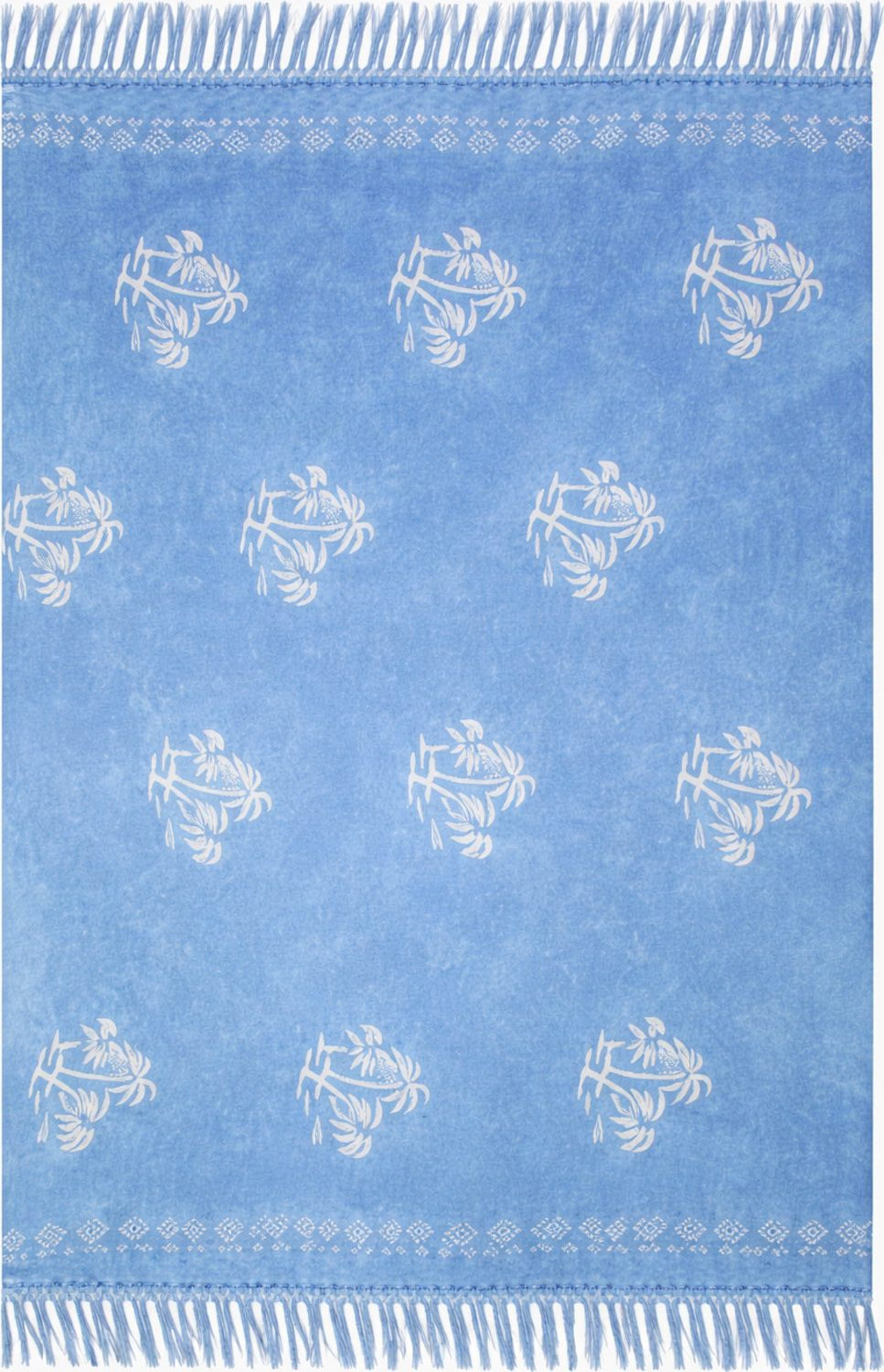 Blue sarong with white palm patterns and frayed edges