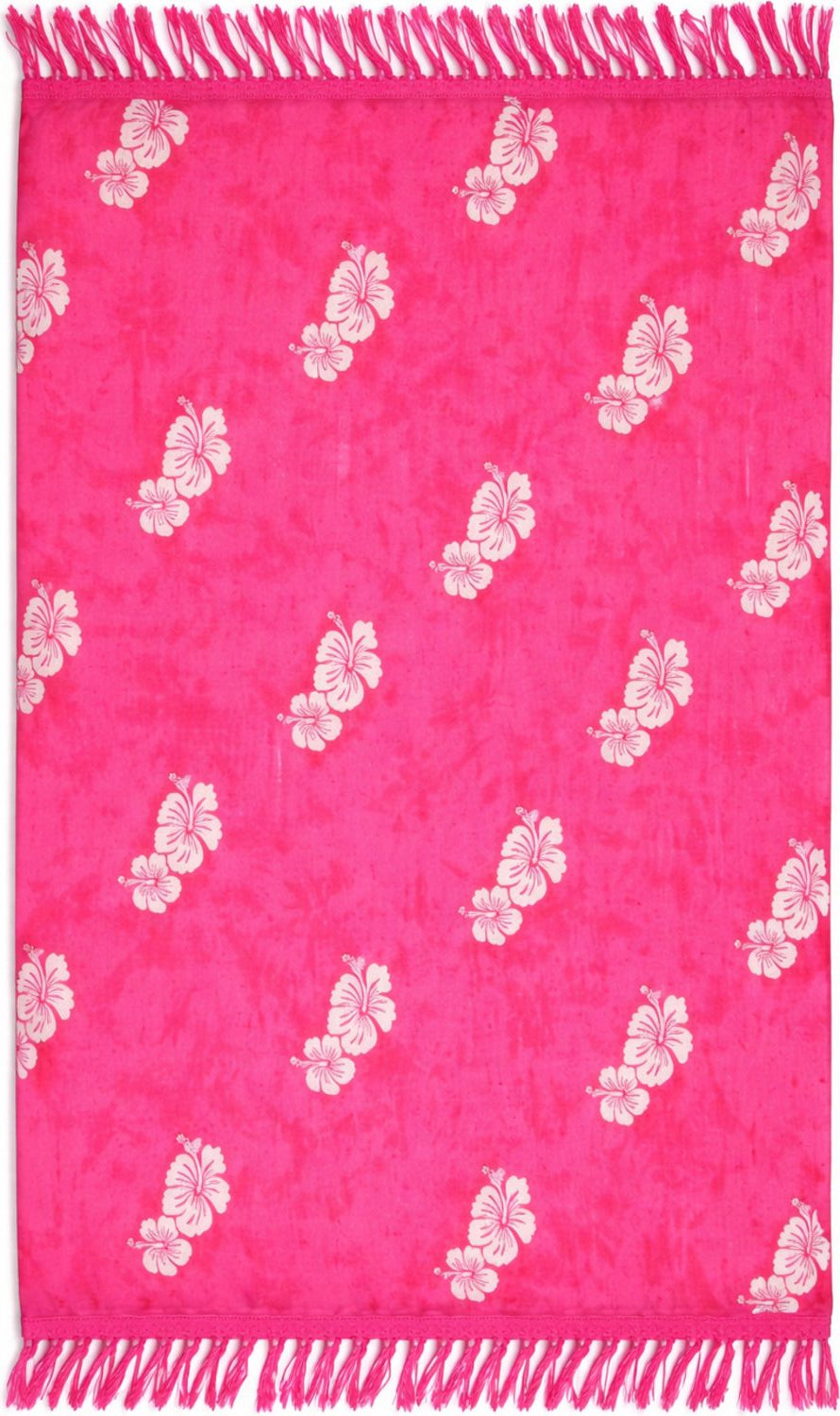 Pink sarong with white floral patterns and fringe.