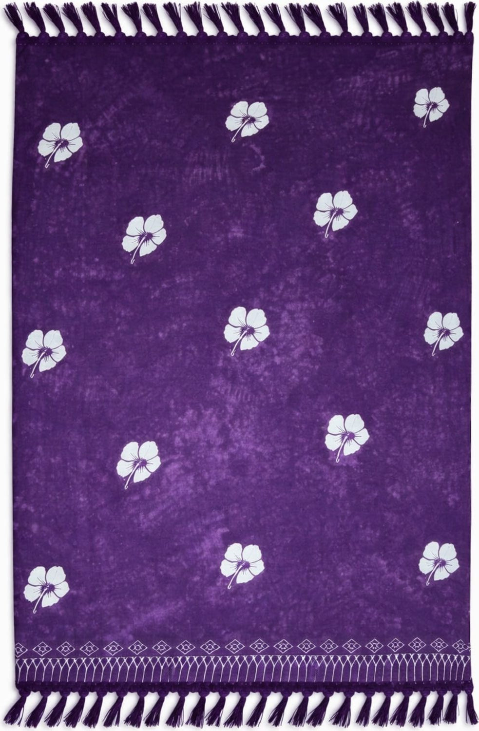 Purple sarong with white floral patterns.