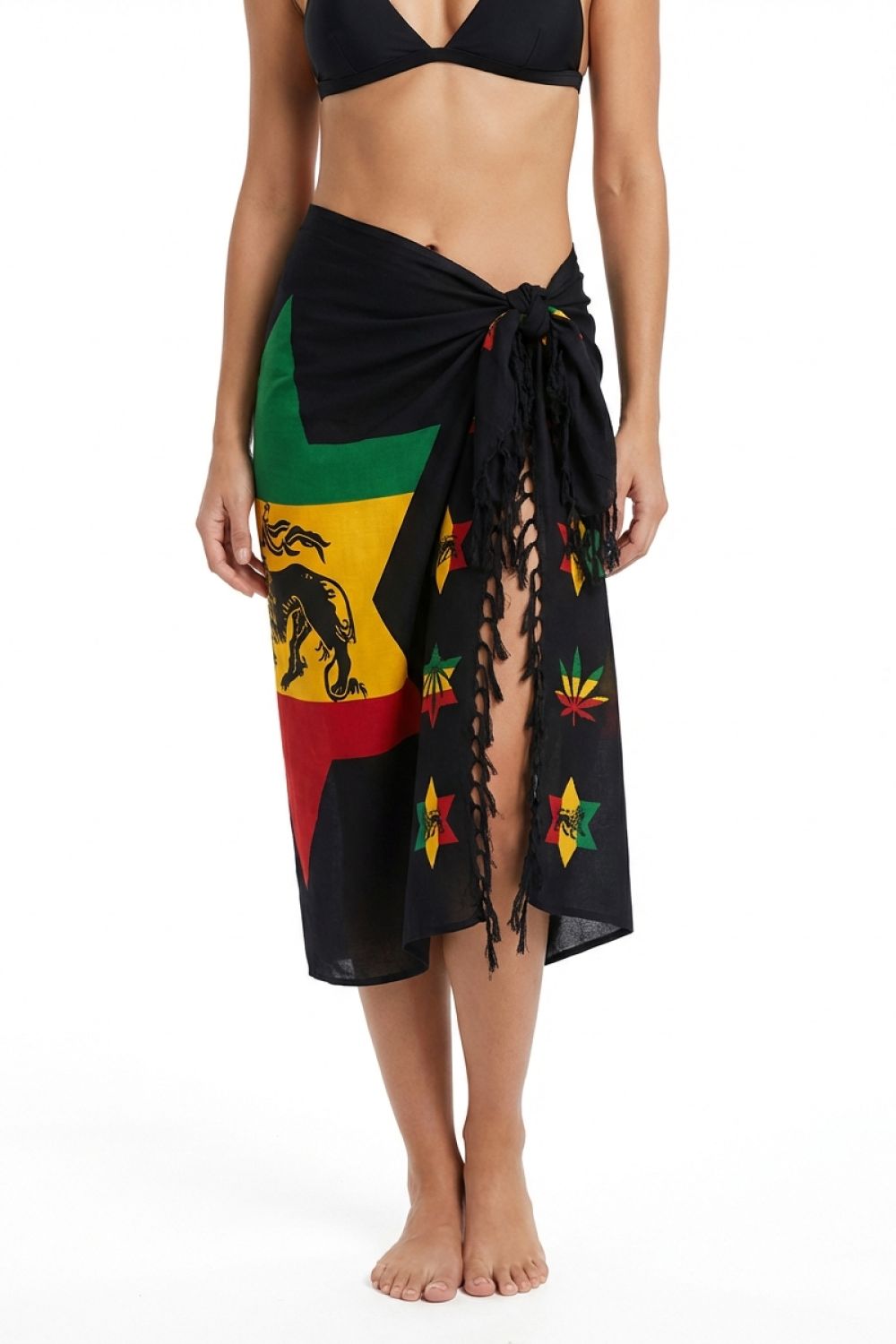 Person wearing a colorful rasta patterned sarong on a white background