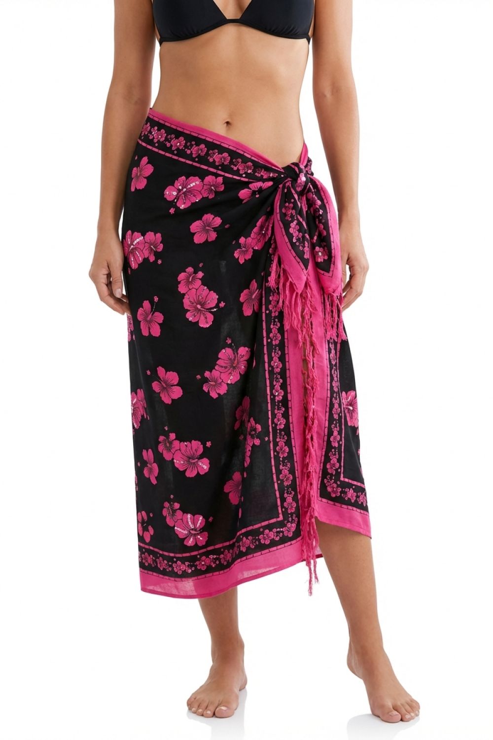 Woman wearing a Black and pink sarong with sequins.