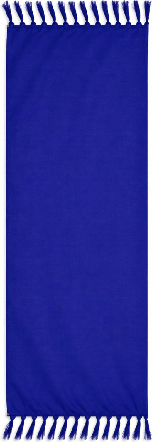 Blue half size sarong with white fringe on a plain background