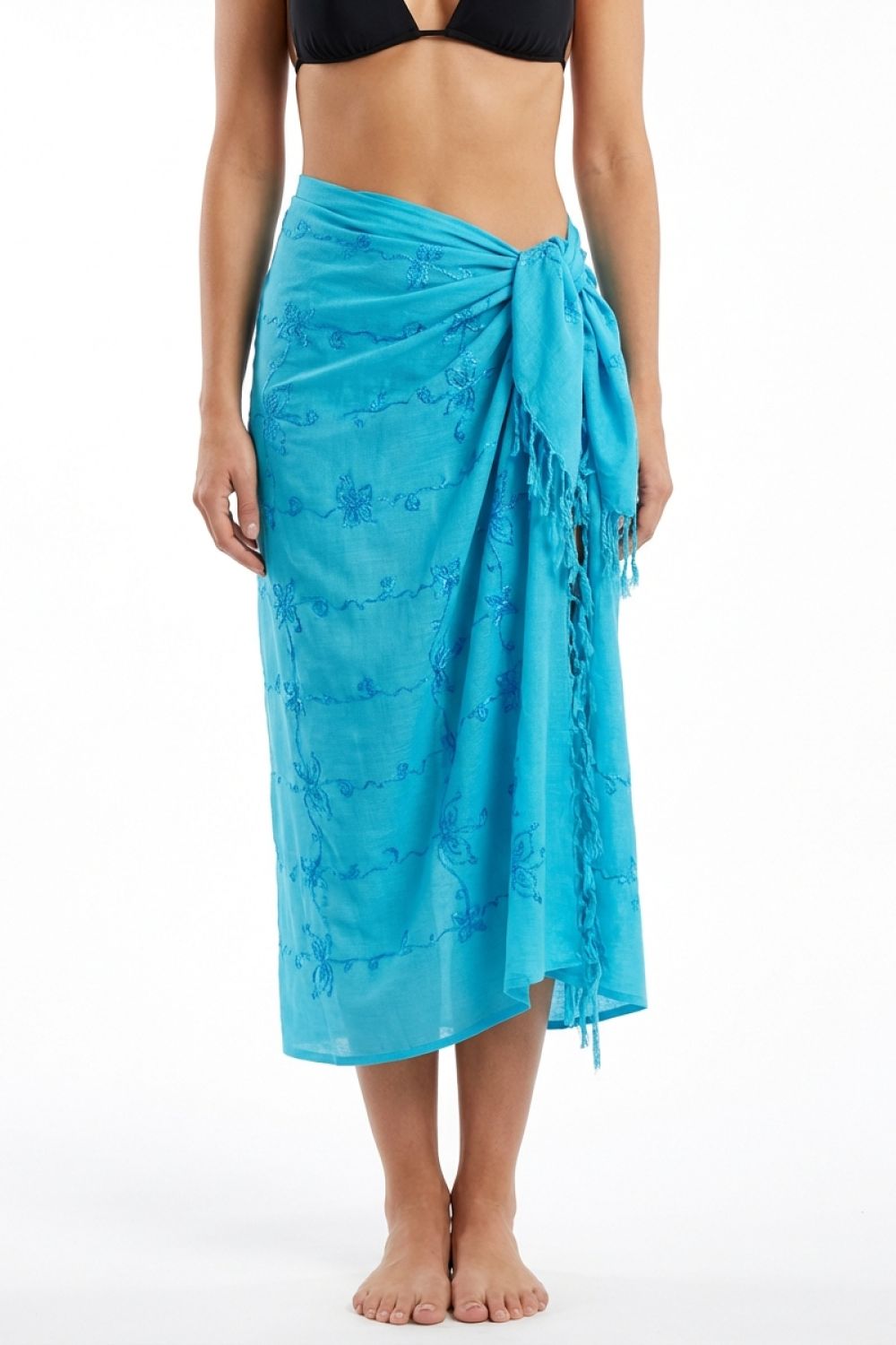 Woman wearing a blue sarong on a white background