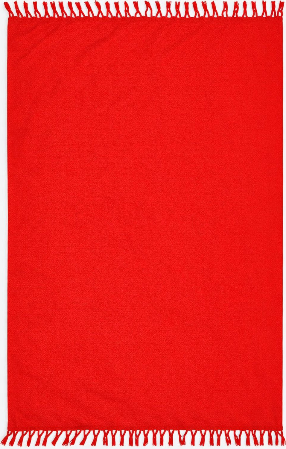 Red sarong with fringe on a plain background