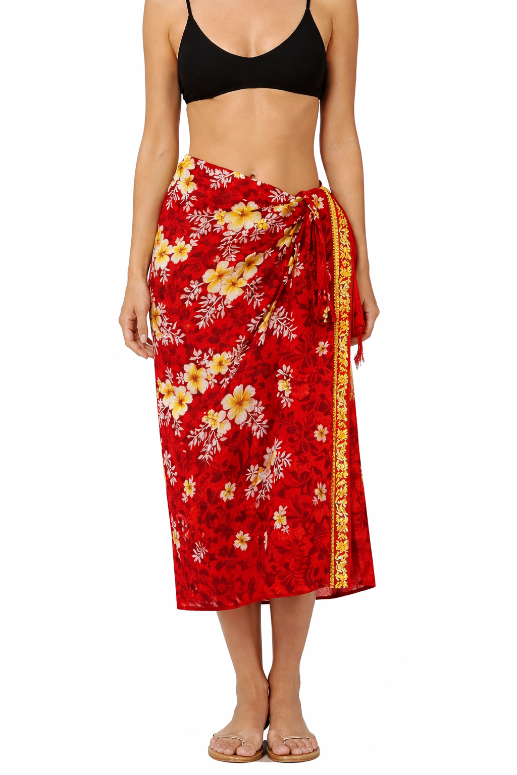 Red floral sarong worn by a person on a white background