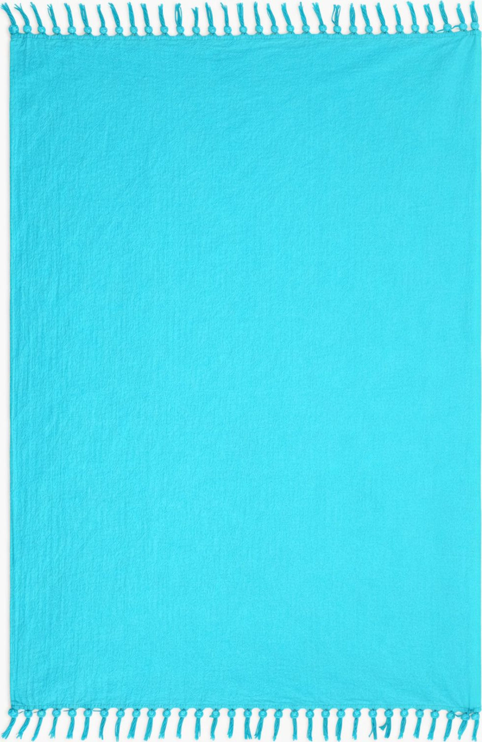 Turquoise sarongs with white fringe on a blue background