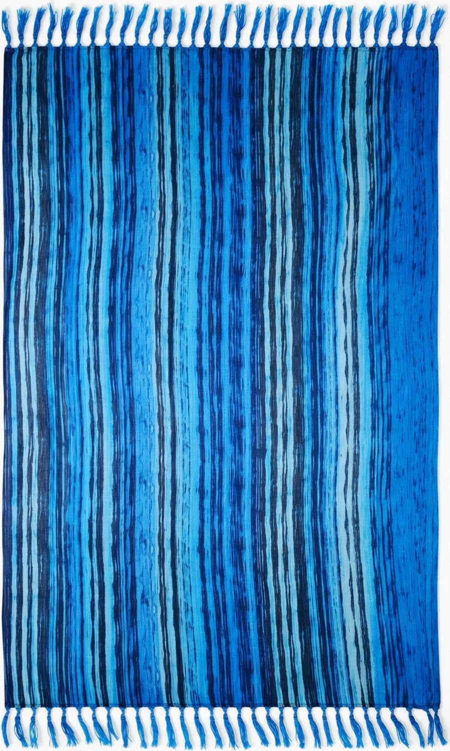 Blue striped sarong with fringe on a plain background