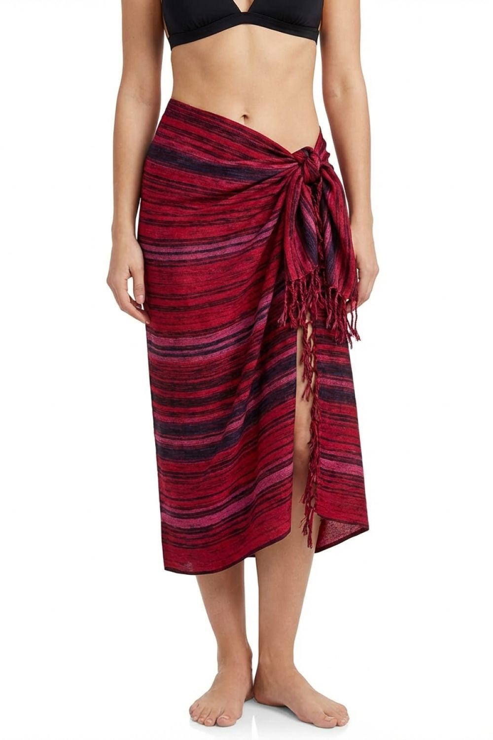 pink and black striped sarong worn by a person on a white background